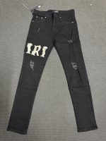 Pantalones AMIRI Gothic Logo Negro Slim