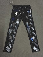 Pantalones AMIRI Paint Splatter Cross Negro
