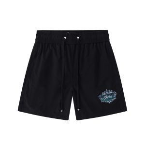 Cortos Amiri Negros con Estampado Mosaico Verde y Logo Bordado