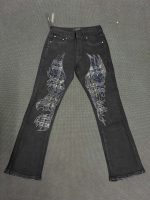 Pantalones AMIRI Eagle Wing Studded Flare Negro